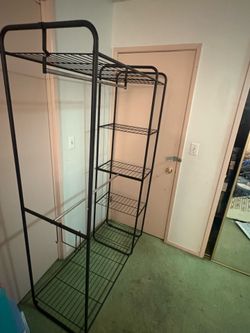 Double closet rack with shelves