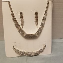 Sparkling silver-tone necklace, bracelet and matching earrings. 