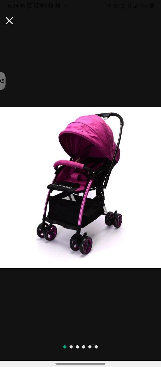 Wonder buggy Lightweight Pink stroller W/ Reversible handle