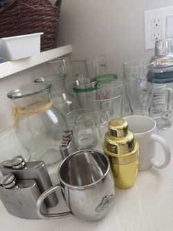 Assorted glassware, vases and flasks