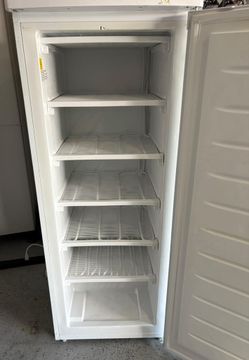 White Thomson Upright Freezer. Upright stand-up deep freezer (6.5 cubic feet)