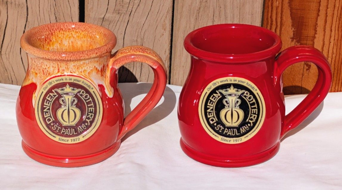 Pair of 2020 Deneen Pottery Logo Midway Mugs (13 oz.) signed by the fleet footed Niles Deneen