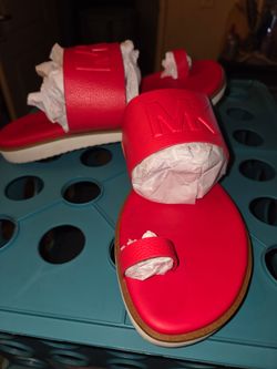 Red Michael Kors thong sandals