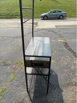 Kitchen storage stand with outlets