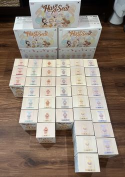 POP MART HAVE A SEAT LABUBU VINYL PLUSH DOLL