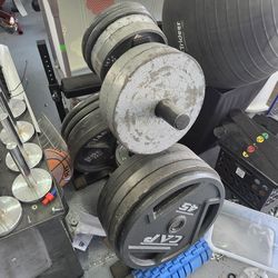 Weight tree and 590 pounds of Olympic weights