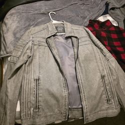 Large synthetic leather jacket from the buckle 