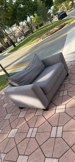 Loveseat with pull out twin bed! MUST GO