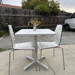 White Dining Table With 2 Stackable Chairs  Great For Smaller Spaces Or Balcony 