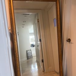 Beautiful full-length floor mirror featuring an ornate, antique-style gold frame - 42” x 78” 