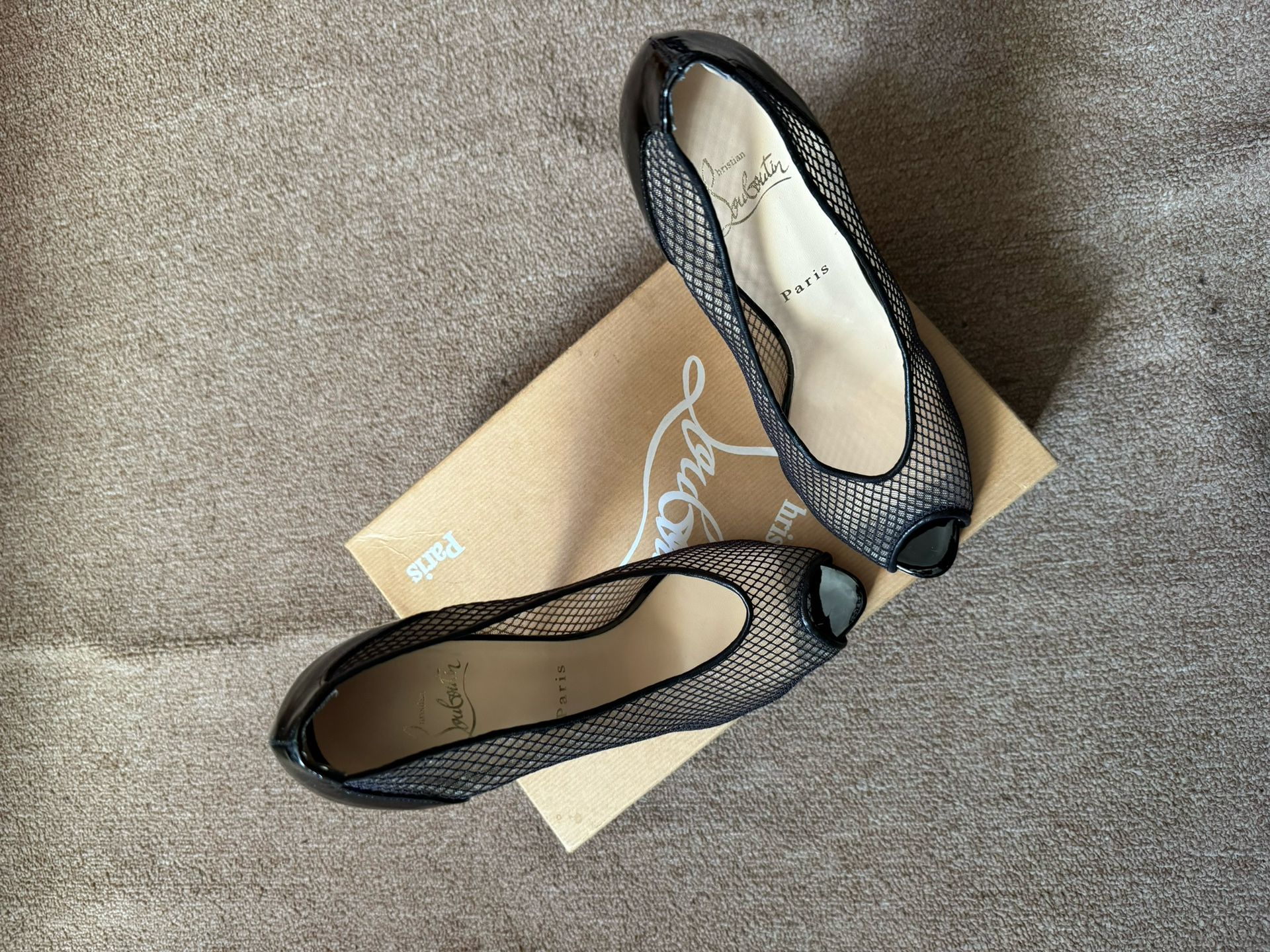 christian louboutin heels fishnet