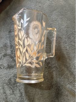 Jeanette marigold carnival glass pitcher