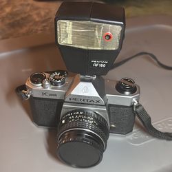 Pentax K1000/ 50mm lens with Pentax  af160 flash