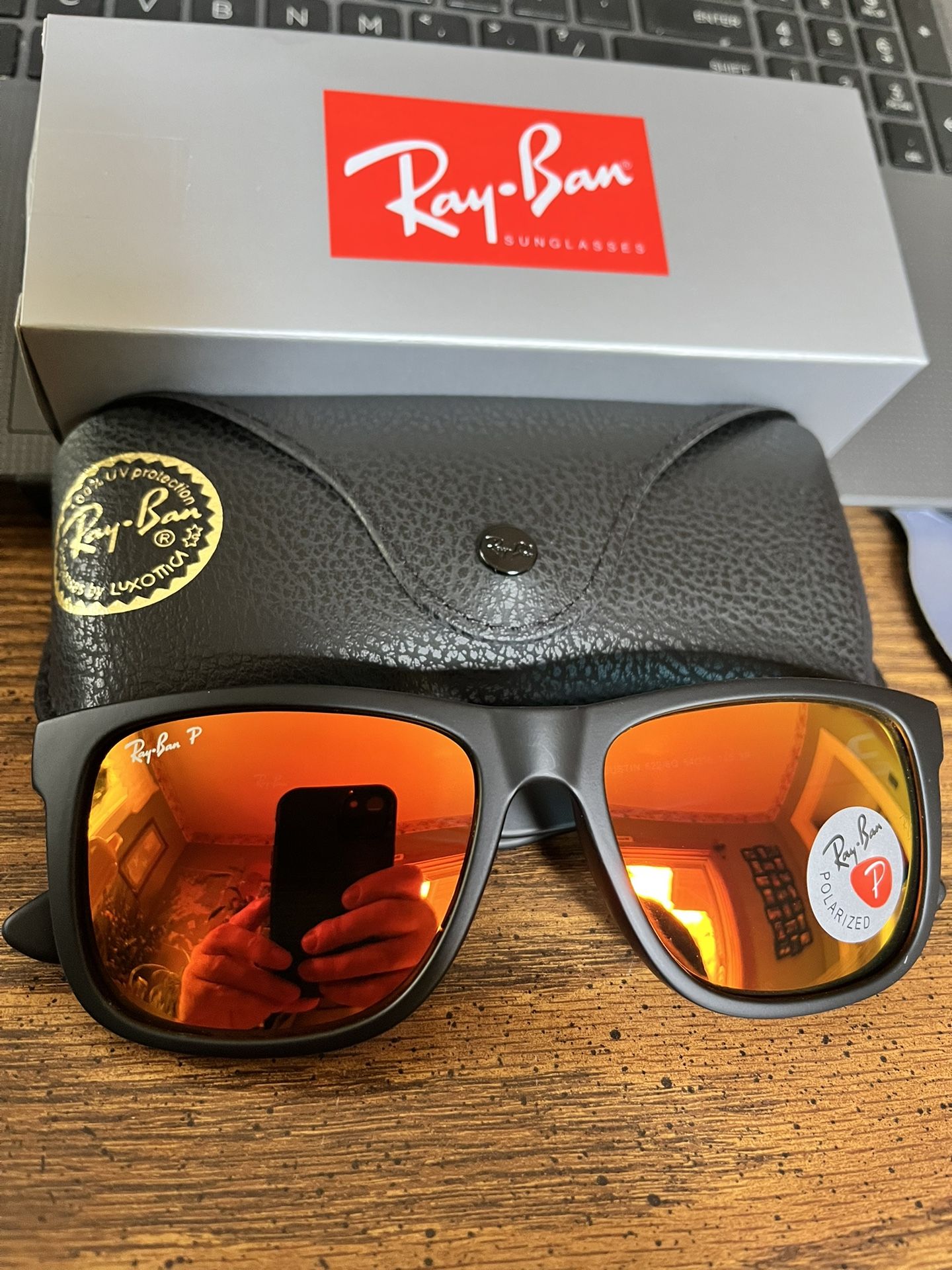 Ray Ban Justin’s 54mm.  Black Frame with Polarized Red Flash Mirror Lenses. Brand New & Authentic. 