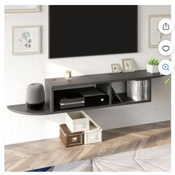 Floating tv stand (still in box)