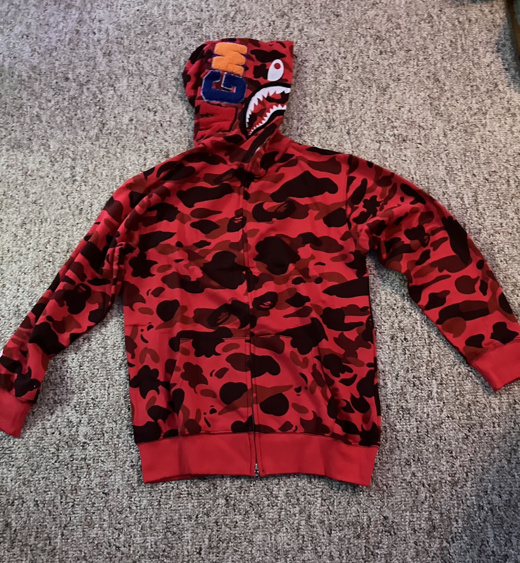 Red and black BAPE hoodie
