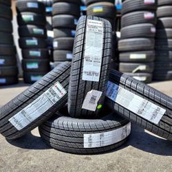 (4) 195/65R15 UNIROYAL TIGER PAW TOURING A/S 75K MILE ALL SEASON TIRES FREE INSTALL