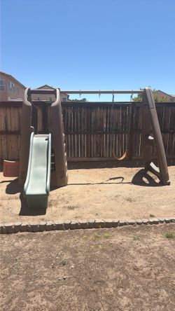 Playground with slide and swing