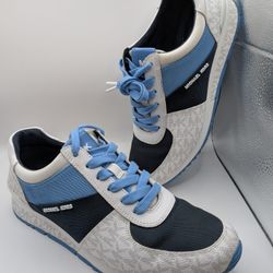 NEW Michael Kors Allie wrap trainer sneaker in a two-tone blue and white Signature-print canvas with a rubber sole.