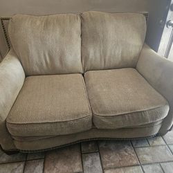A Three Piece And Love Seat Furniture 