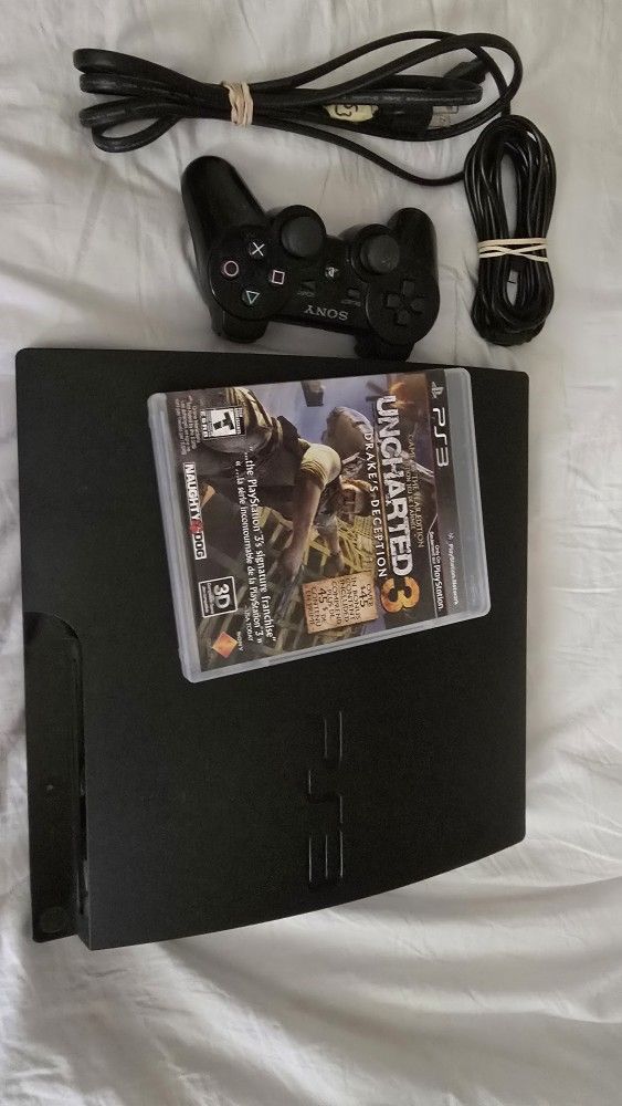 Playstation 3 Slim (PS3) console with game + controller