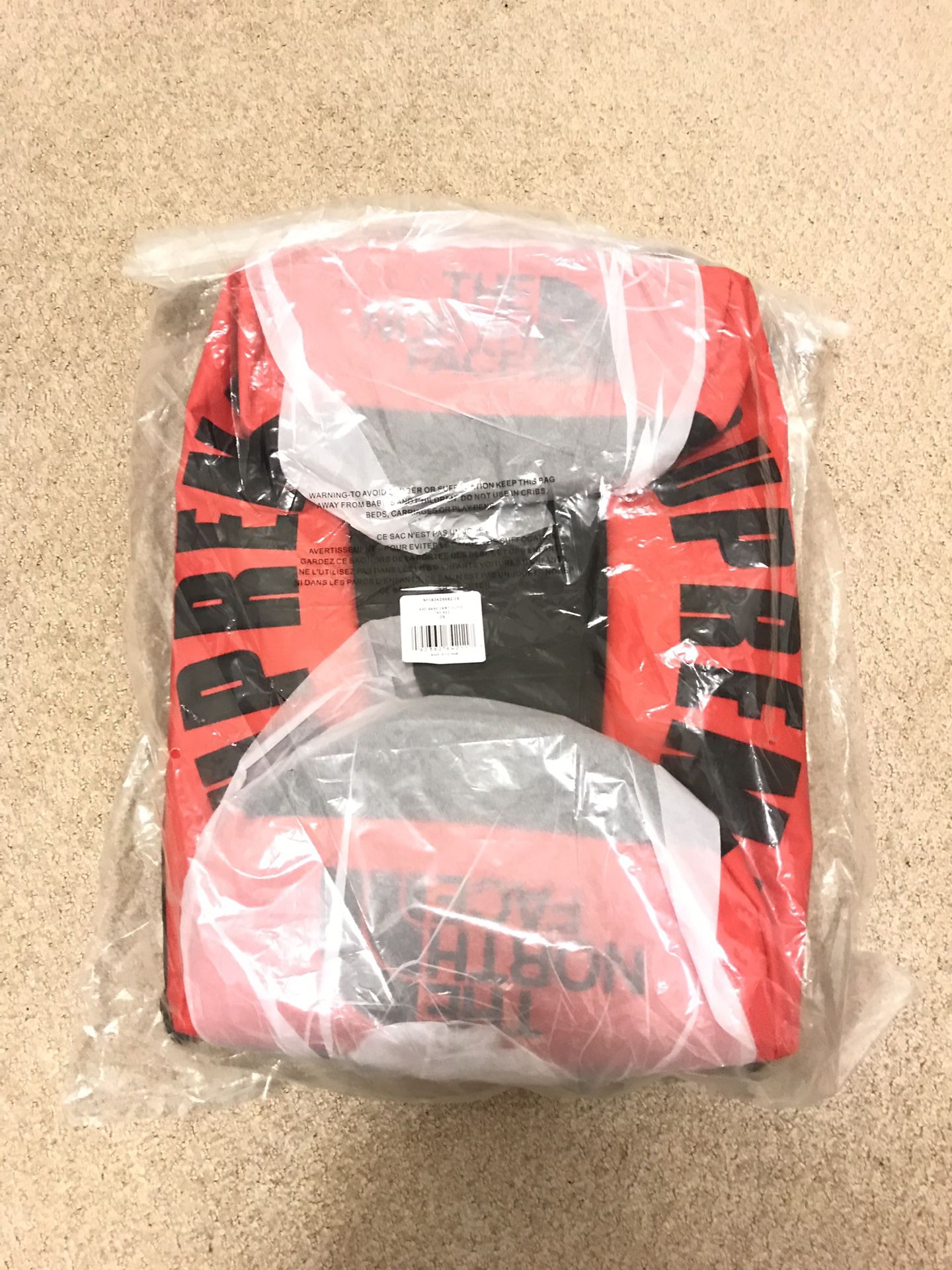 Supreme x The North Face Arc Logo Duffle Bag (Red)