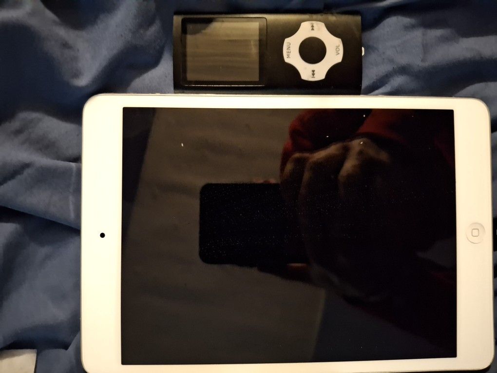 Apple IPad And Mp3 Player