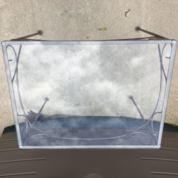 Small metal glass top side table