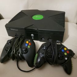 Original XBOX comes with All Cords and 2 Controllers 