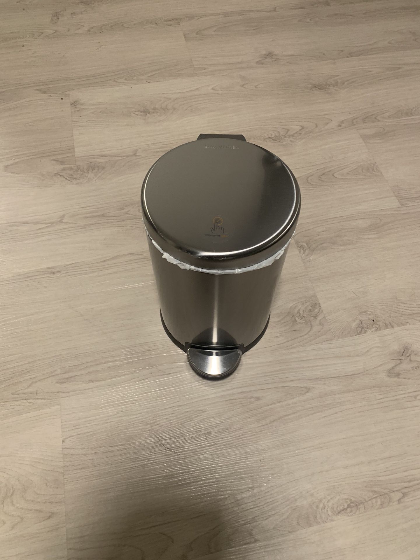 Silver trash can