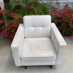 White mid-century modern style chair