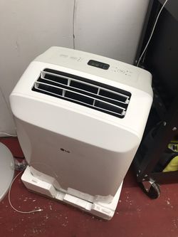 Like new lg 8000 Btu air conditioner with remote and accessories