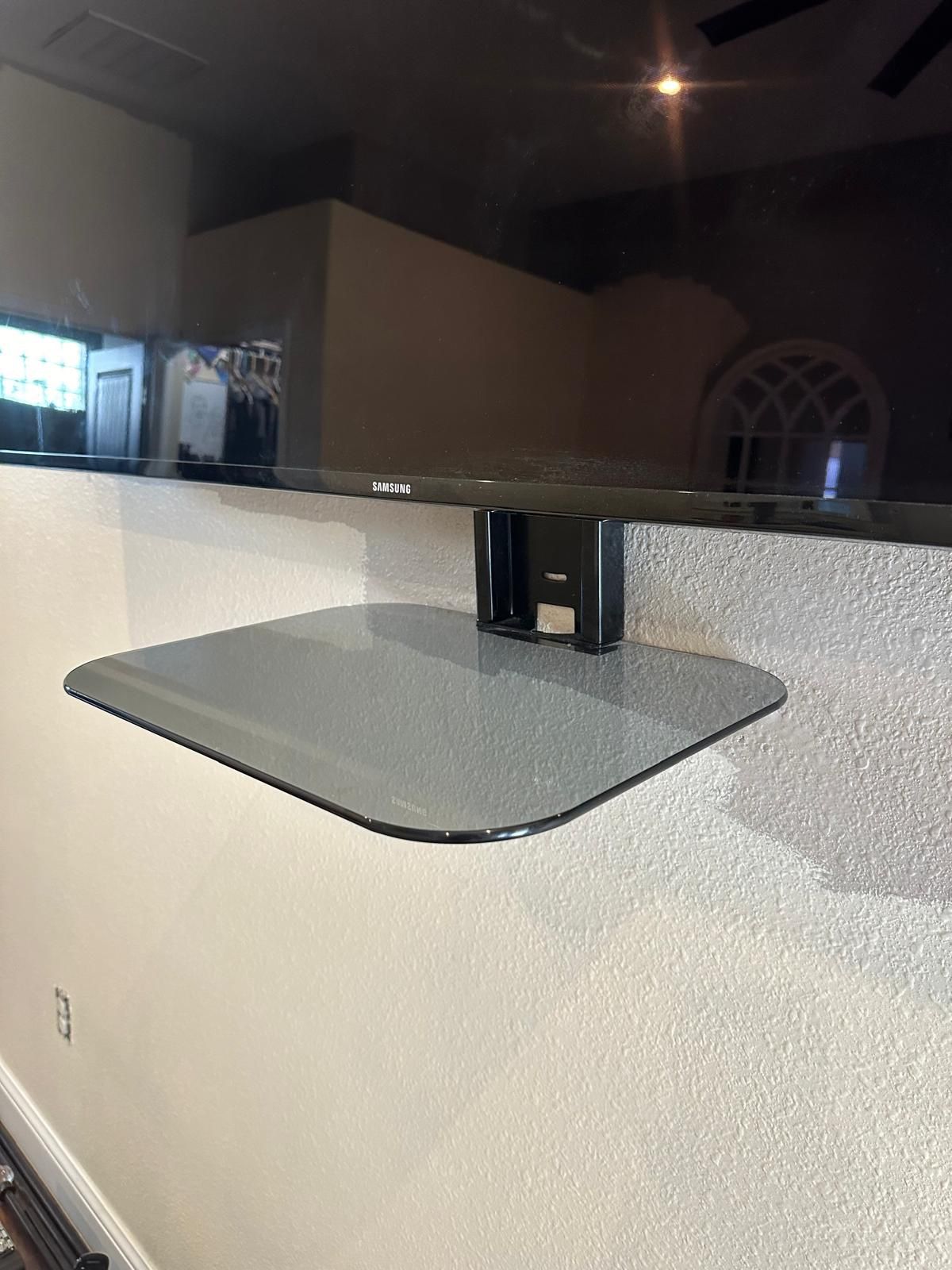 Floating glass shelf for DVD cable box