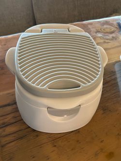 Munchkin Potty training toilet