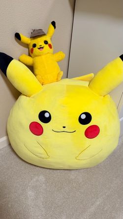 Extra large pikachu and small pikachu