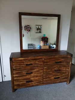 6 drawer dresser with  a big mirror