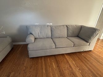 2 gray couches sectional