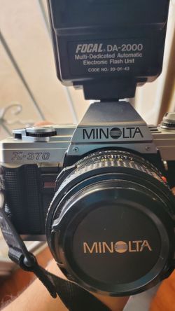 Minolta x-370 with flash unit , and strap