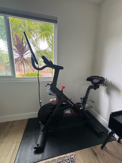 Barely Used Peloton, Wide Seat, Mat, and 2 Pairs of Shoes