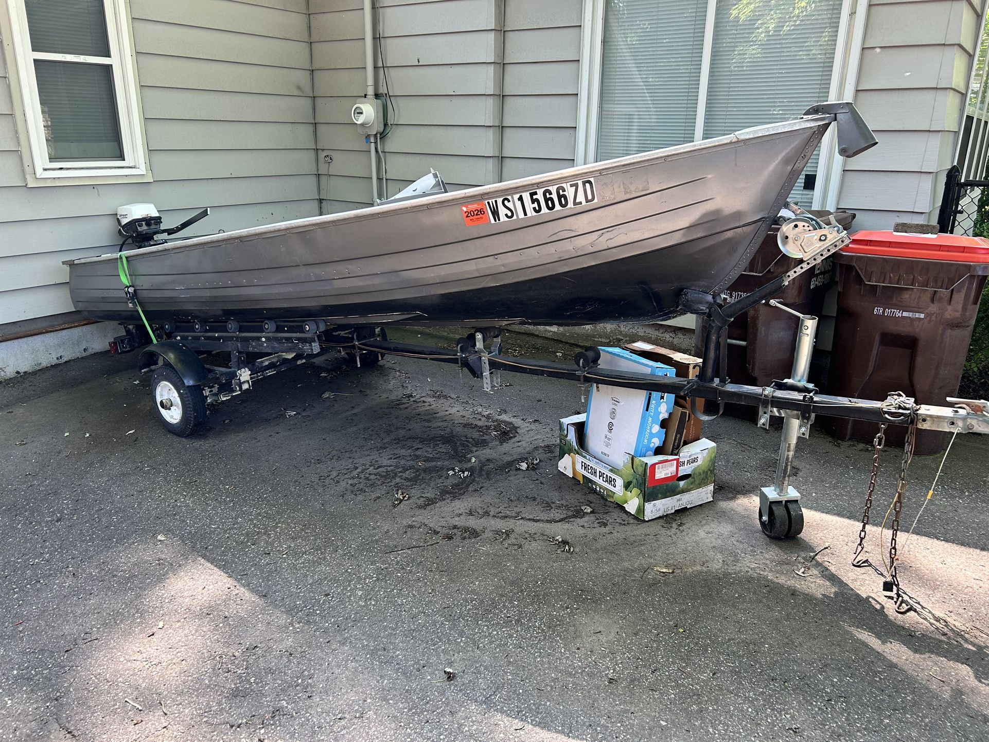 14 ft aluminum fishing boat With Trailer. Both In Good Condition.