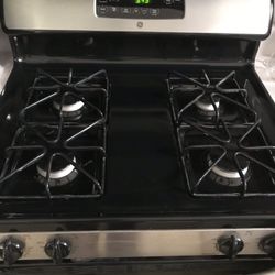 Great  condition! GE Gas Range & Matching Microwave Oven $250 Or Best Offer 