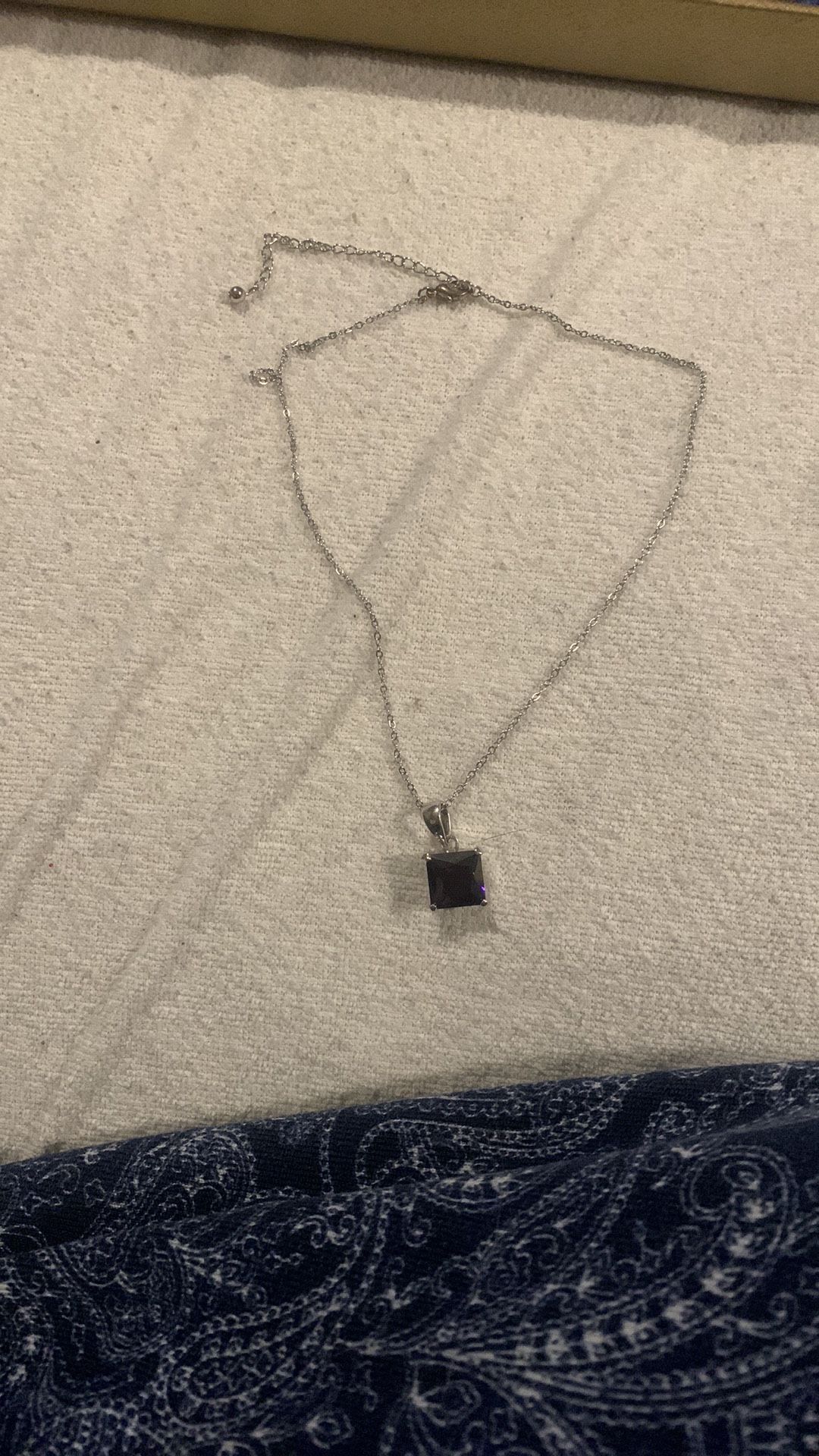 Elegant Silver Necklace with Purple Pendant