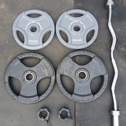 Olympic Weight plates with Olympic Crul Bar