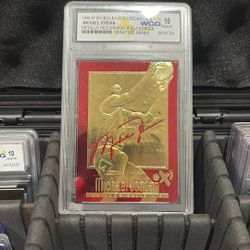 23kt Gold Michael Jordan 1996-97 Skybox Metallic Red Signature In A Mint 10 Grade 