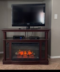 Tv and tv stand w/ electric fireplace
