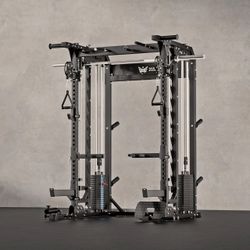 Smith machine squat rack home gym dumbbells kettlebells rubber flooring bench bar leg press weights bumper plates