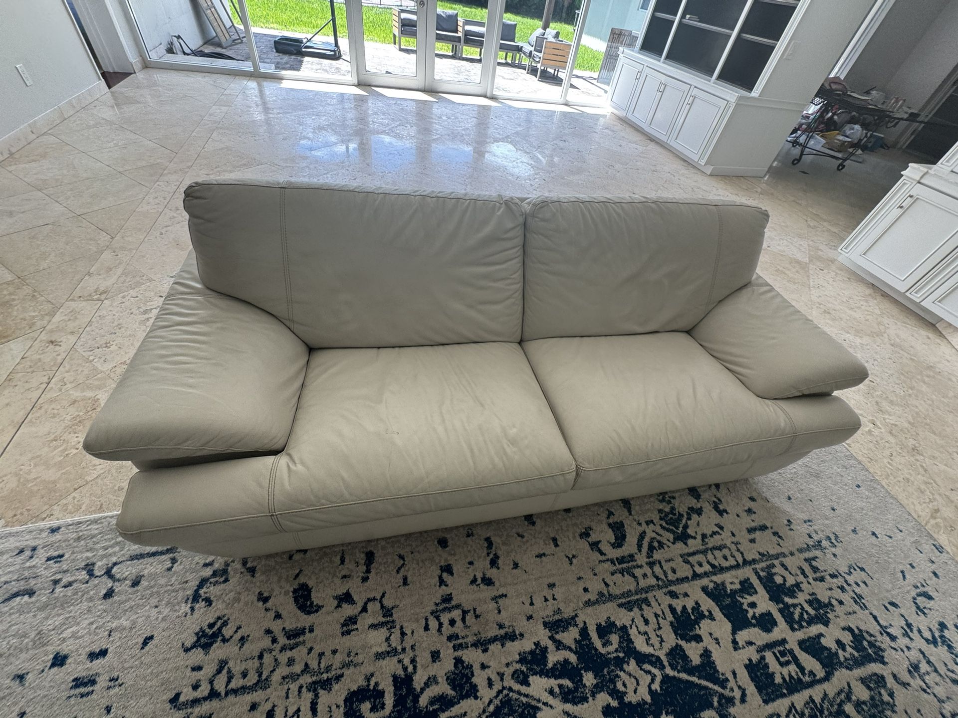 Modern Beige Leather Sofa – Comfortable & Stylish