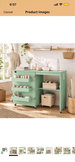Fold out sewing table cabinet