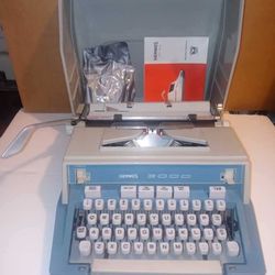 Vintage Hermes Portable Typewriter in case w/Manual

