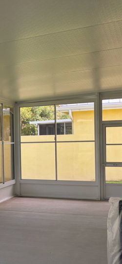 Vinyl porch window